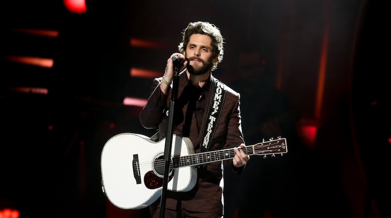 NASHVILLE, TENNESSEE - OCTOBER 16: Honoree Thomas Rhett performs onstage during the 2019 CMT Artists of the Year at Schermerhorn Symphony Center on October 16, 2019 in Nashville, Tennessee. (Photo by Terry Wyatt/Getty Images)
