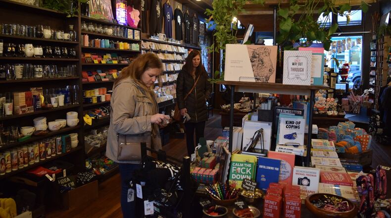 Heart Mercantile in the Oregon District will be open longer hours starting this week. For small business Saturday, the store will give away a free tote to anyone who spends more than $100. STAFF PHOTO / HOLLY SHIVELY