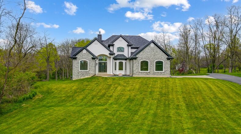 This renovated Colorado-style home is on 15 acres in Butler Twp. CONTRIBUTED PHOTOS BY REALTOR