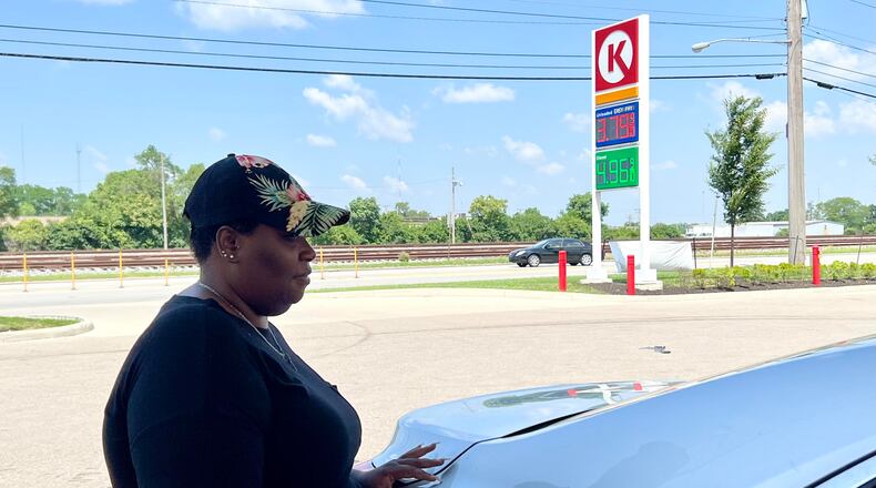 Wilma Sampson, of West Dayton, said she traveled out of her neighborhood, where gas prices were still over $4 per gallon Thursday, to fill up for $3.79 per gallon at Circle K on West Dorothy Lane. AIMEE HANCOCK/STAFF