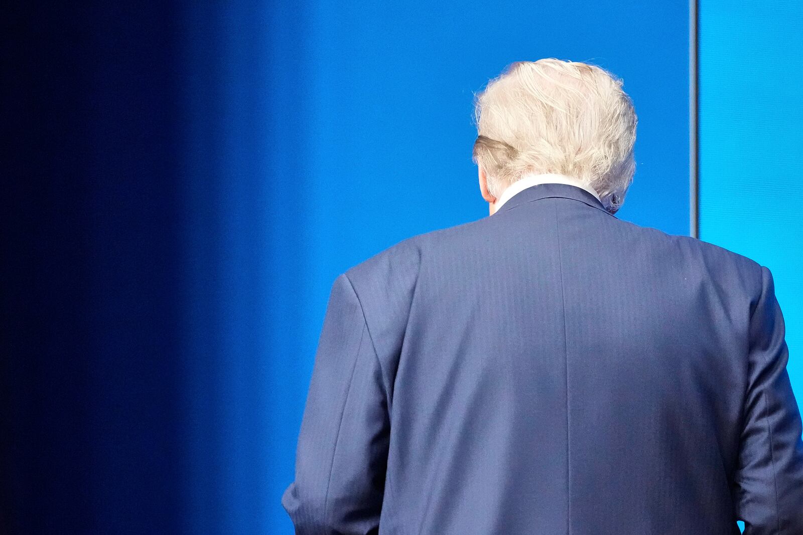 President Donald Trump leaves at the end of a press conference after the plenary session at the NATO summit in The Hague, Netherlands, Wednesday, June 25, 2025. (AP Photo/Markus Schreiber)