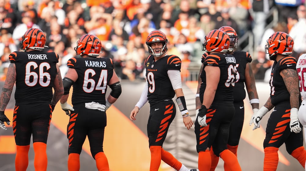 Cincinnati Bengals quarterback Joe Burrow (9) reacts during the first half of an NFL football game against the Arizona Cardinals, Sunday, Dec. 28, 2025, in Cincinnati. (AP Photo/Jeff Dean)