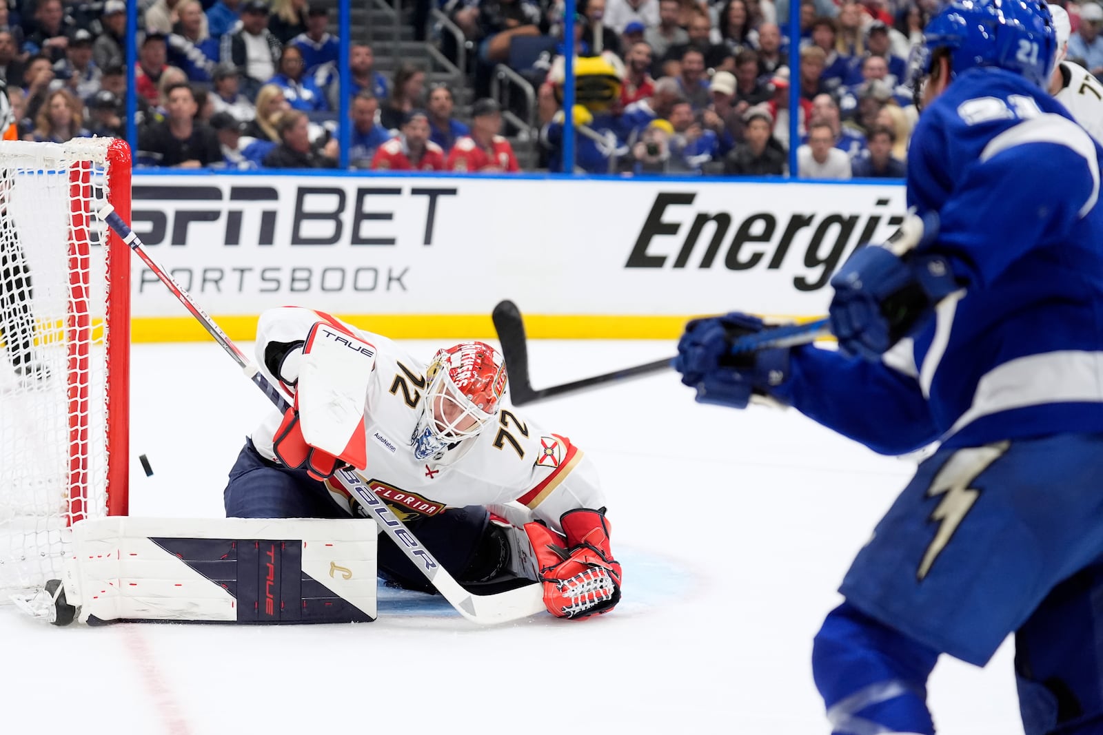 Florida Panthers goaltender Sergei Bobrovsky (72) can't stop a shot by Tampa Bay Lightning center Brayden Point (21) during the second period in Game 1 of an NHL hockey Stanley Cup first-round playoff series, Tuesday, April 22, 2025, in Tampa, Fla. (AP Photo/Chris O'Meara)