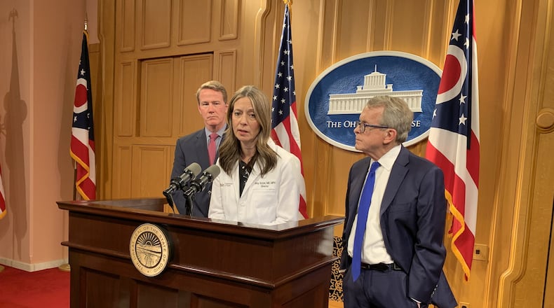 Ohio Department of Health Director Dr. Amy Acton, Gov. Mike DeWine and Lt. Gov. Jon Husted hold a press conference on Coronavirus. DeWine appointed Acton as health director in February 2014.