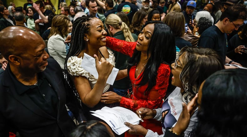 Boonshoft School of Medicine students from left, Aisha Jamison and Elisabeth Adkins celebrate their Match Day assignments at Wright State University, Friday, March 17, 2023. JIM NOELKER/STAFF