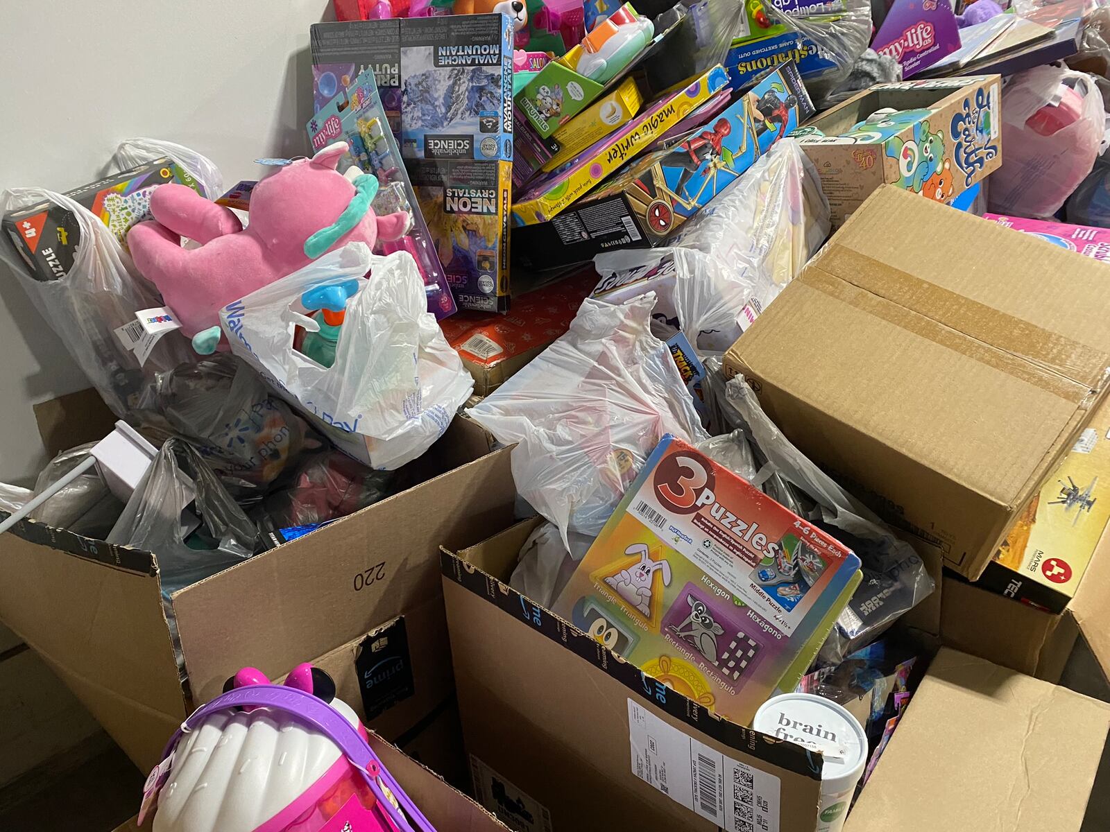 People came to a parking lot on Saturday, Dec. 16, 20223 off North Keowee Street in Dayton to donate stuffed animals, toys and more to Dayton Children's Hospital for the holidays. Eileen McClory / staff