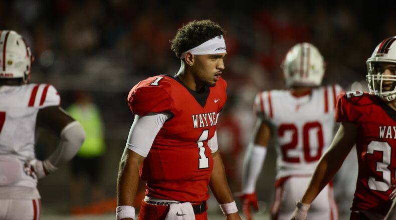 Wayne's Tyrell Lewis returns to the bench after running for a score against Fairfield in the second half on Friday, Aug.18, 2023, at Heidkamp Stadium in Huber Heights. David Jablonski/Staff