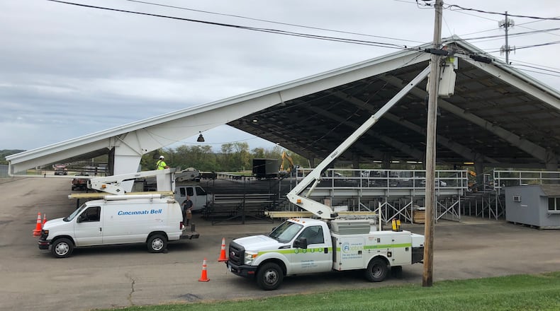 Cincinnati Bell crews were working on Wednesday in anticipation of President Donald Trump’s rally Friday night at the Warren County Fairgrounds in Lebanon. STAFF/LAWRENCE BUDD