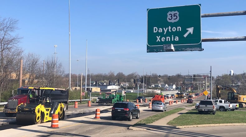 Crews work on the Smithville Road bridge over U.S. 35 on April 6, 2020, as part of a reconfiguration of the highway interchange. JEREMY P. KELLEY / STAFF