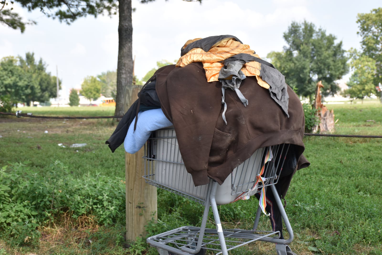 The city of Dayton cleared a homeless encampment at McIntosh park on Aug. 6, 2025. Unsheltered people living there packed up their stuff and moved elsewhere, including to a vacant site a few blocks away. CORNELIUS FROLIK / STAFF