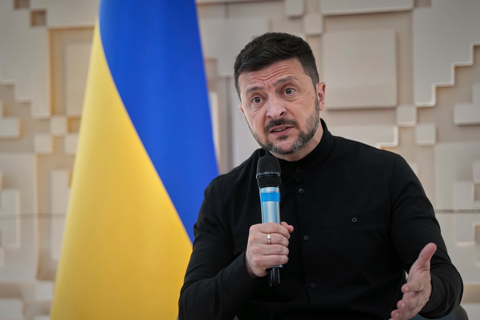 Ukrainian President Volodymyr Zelenskyy talks to journalists at the Ukrainian Embassy in Ankara, Turkey, Thursday, May 15, 2025. (AP Photo/Evgeniy Maloletka)