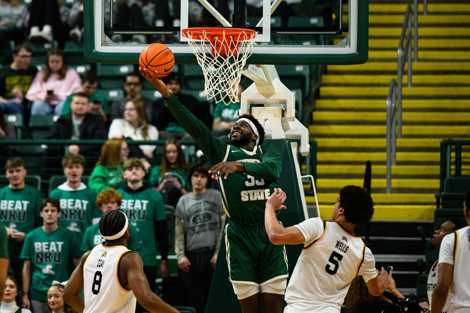 Wright State University's Michael Imariagbe shoots the ball between two Northern Kentucky University defenders during their game on Saturday, Jan. 24, 2026. JEREMY MILLER / CONTRIBUTED PHOTO