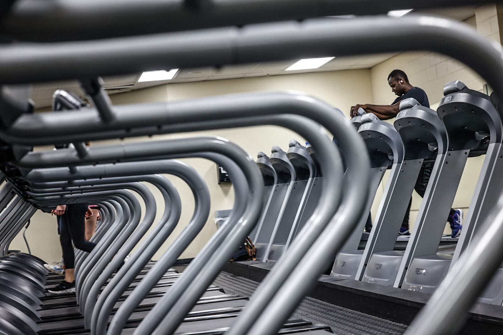 Treadmills are side by side at Everybody Fitness on Woodman Drive in Kettering. JIM NOELKER/STAFF