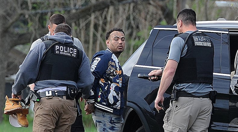 Shawn Michael McLean was arrested Wednesday, April 14, 2021, in Dayton after law enforcement officers responded to a house on North Main Street. He was wanted on a parole violation and indicted on domestic violence, assault and aggravated menacing last year. MARSHALL GORBY\STAFF