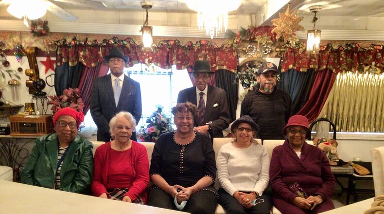 Pre-pandemic, Njoy! Njoy! volunteers hosted weekly lunches for those in West Dayton. Standing (left to right) are William Canady, Dr Rev Terry Hill and Sam Black.
Sitting (left to right) Jackie Richardson, Liz Crowder, Freida Oriakhi, Linda Black and Lucille Tyree. CONTRIBUTED