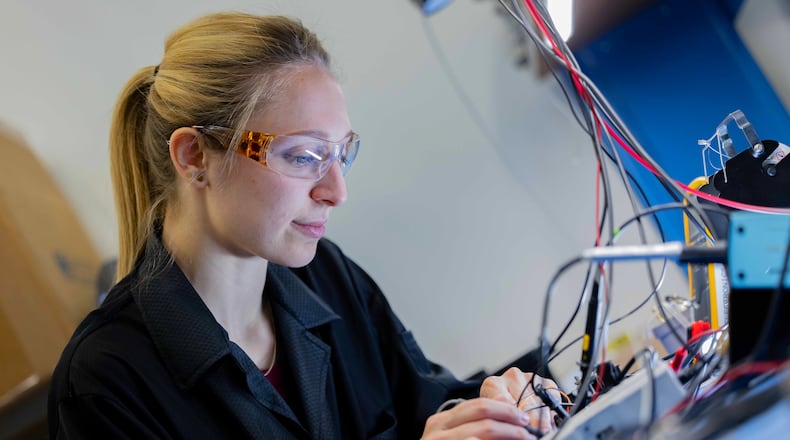 Elyssa Sarajlic, GE Aerospace electronic hardware design engineer, works at the company’s Electrical Power Integrated Systems Center, or EPISCenter in Dayton. GE Aerospace’s investment into its Dayton area facilities in the past two years totals $53.7 million. CONTRIBUTED