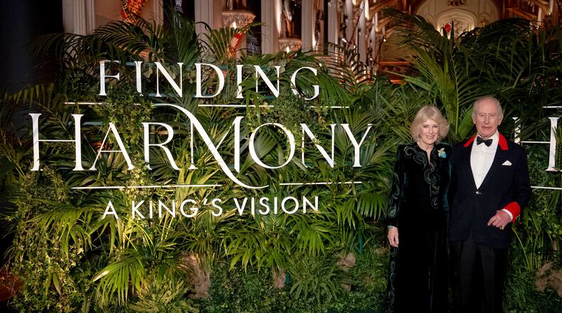 Britain's King Charles III and Queen Camilla attend the premiere of Finding Harmony: A King's Vision, at Windsor Castle in Berkshire, England, Wednesday, Jan. 28, 2026. (Aaron Chown/PA via AP)