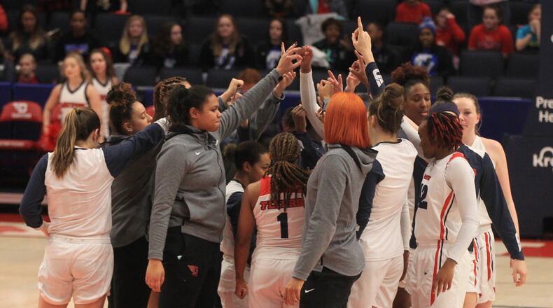 Dayton huddles before a game against Rhode Island on Sunday, Feb. 9, 2020, at UD Arena. David Jablonski/Staff