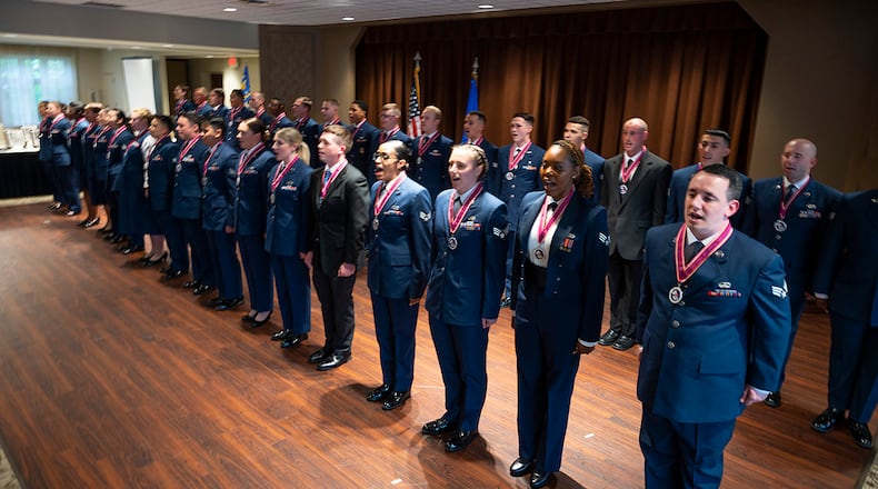 Airman Leadership School Class 22-D members recite the Airman’s Creed during their graduation ceremony May 5 at the Wright-Patterson Club. ALS is required for staff sergeant selects and open to eligible civilians as Airmen learn more about leadership and Air Force culture. U.S. AIR FORCE PHOTO/R.J. ORIEZ