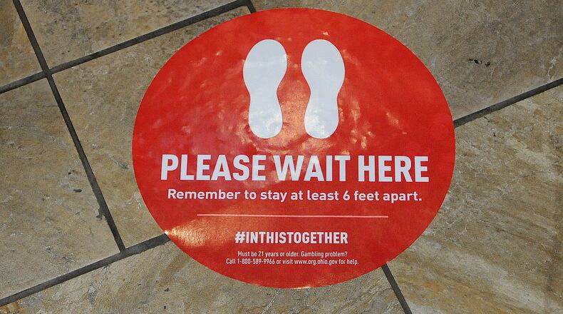 Dayton is offering small businesses grants from CARES Act funding to pay for coronavirus pandemic expenses related to facility improvements needed to meet health and safety standards. MARSHALL GORBY / STAFF