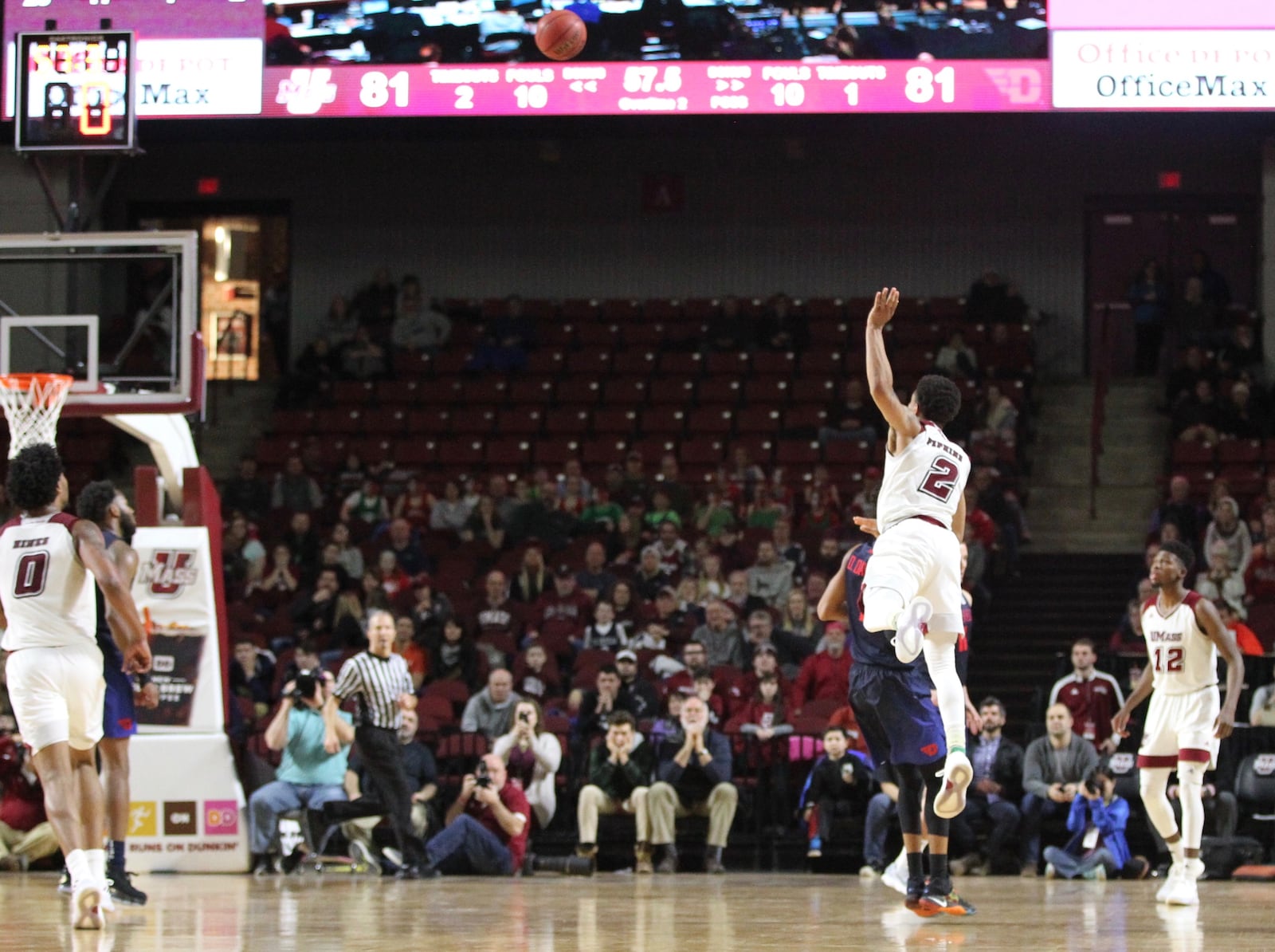 Massachusetts guard Luwane Pipkins makes a go-ahead 3-pointer with 55 seconds left against Dayton on Saturday, Feb. 3, 2018, at the Mullins Center in Amherst, Mass. David Jablonski/Staff