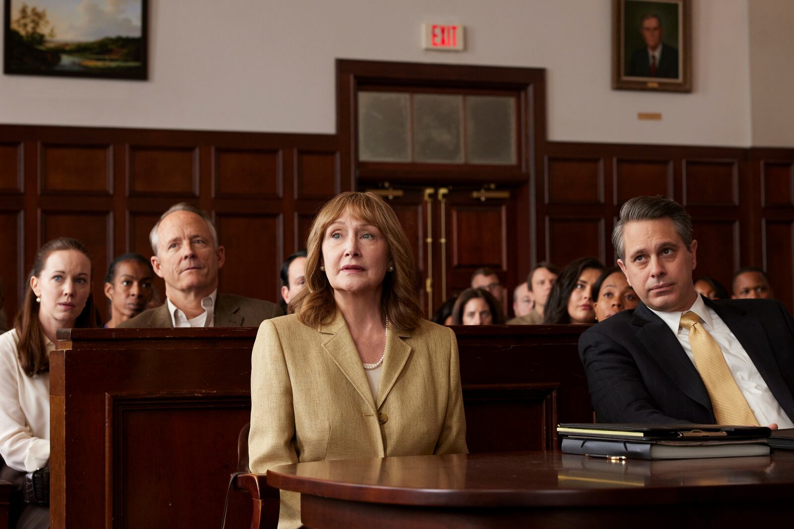 This image released by Blue Harbor Entertainment shows Patricia Clarkson as Lilly Ledbetter, center, in a scene from "Lilly." (Blue Harbor Entertainment via AP)