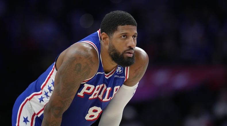 FILE - Philadelphia 76ers' Paul George looks on during a break in play during an NBA basketball game Thursday, Jan. 29, 2026, in Philadelphia. (AP Photo/Matt Slocum, File)