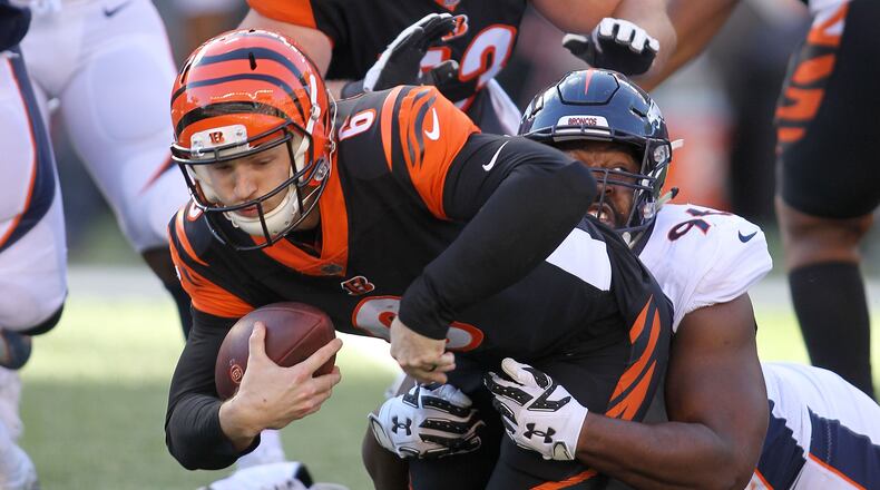 CINCINNATI, OH - DECEMBER 2: Shelby Harris #96 of the Denver Broncos sacks Jeff Driskel #6 of the Cincinnati Bengals during the second quarter at Paul Brown Stadium on December 2, 2018 in Cincinnati, Ohio. (Photo by John Grieshop/Getty Images)