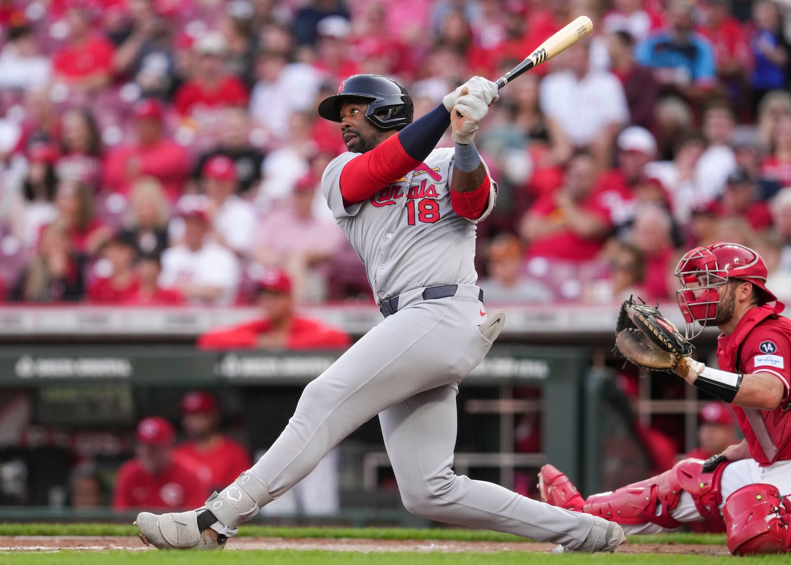 St. Louis Cardinals' Jordan Walker (18) watches his two-run double during the third inning of the second baseball game of a doubleheader against the Cincinnati Reds Wednesday, April 30, 2025, in Cincinnati. (AP Photo/Jeff Dean)