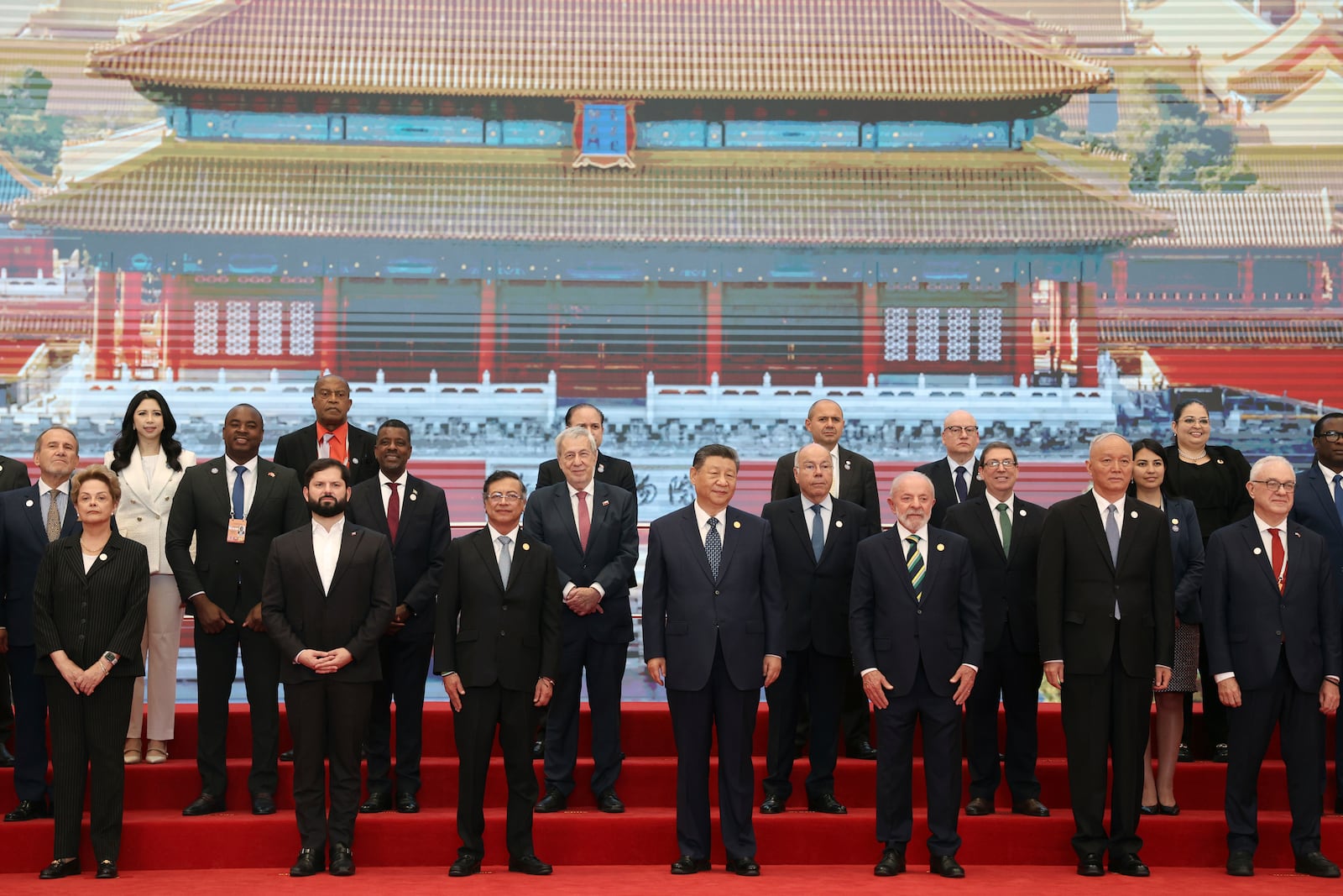 Chinese President Xi Jinping, front center, Brazil President Luiz Inacio Lula da Silva, third left in front, Chile President President Gabriel Boric, second left in front, Colombia President Gustavo Petro, third left in front, and other CELAC representatives attend a group photo session before the opening ceremony for the China-CELAC Forum ministerial meeting in Beijing Tuesday, May 13, 2025. (Florence Lo/Pool Photo via AP)