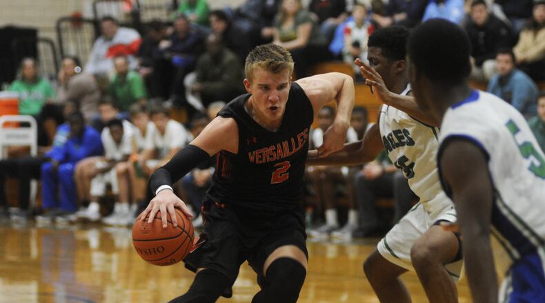 Senior Justin Ahrens of top-ranked Versailles (D-III) scored 34 points in a 68-40 win at Chaminade Julienne on Tuesday. MARC PENDLETON / STAFF