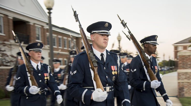 U.S. Air Force Honor Guard members march during the U.S. Air Force Tattoo at Joint Base Anacostia-Bolling, Washington, D.C., Sept. 13, 2017. Service members from across the National Capital Region attended the tattoo in commemoration of the Air Force’s 70th anniversary. (U.S. Air Force photo by Airman 1st Class Valentina Lopez)