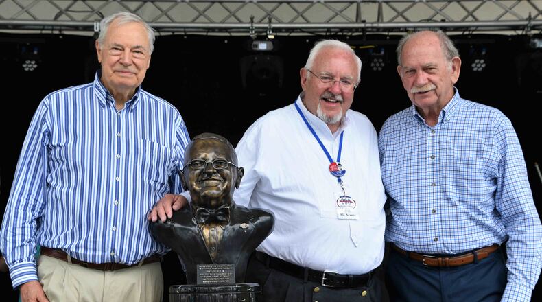Retired Miamisburg Law Director Bill Forbes (left) joined Mayor Dick Church Jr. and city resident Stan Bernard on Saturday for the unveiling of a bust in Church’s honor. CONTRIBUTED BY JAY ROBINSON