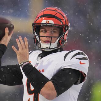 Cincinnati Bengals quarterback Joe Burrow throws a pass during warmups before an NFL football game against the Buffalo Bills, Sunday, Dec. 7, 2025, in Orchard Park, N.Y. (AP Photo/Gene J. Puskar)