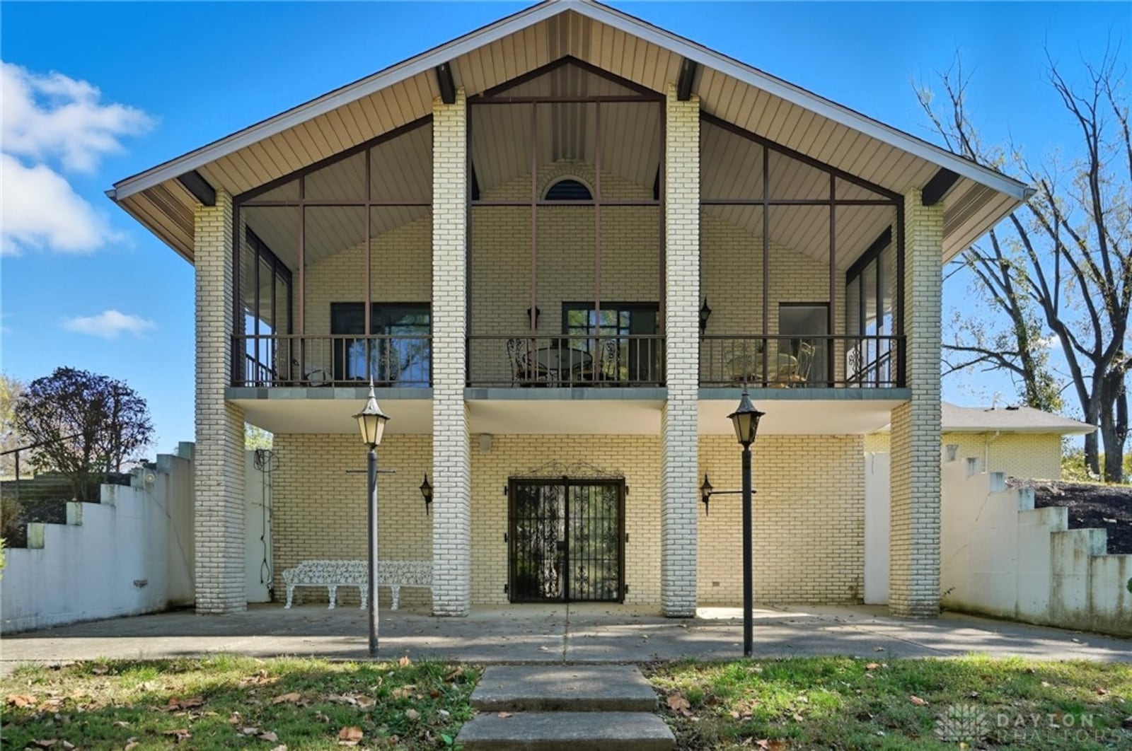 The screened in porch runs across the side of the home and has a vaulted ceiling with doors opening to the kitchen and family rooms. CONTRIBUTED