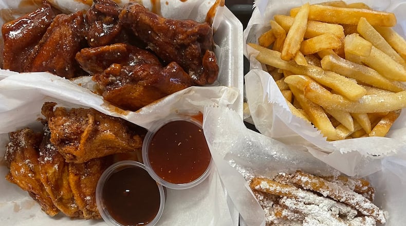 Wings Fly, a family owned and operated restaurant, has opened its doors at 960 Patterson Road in Dayton. NATALIE JONES/STAFF