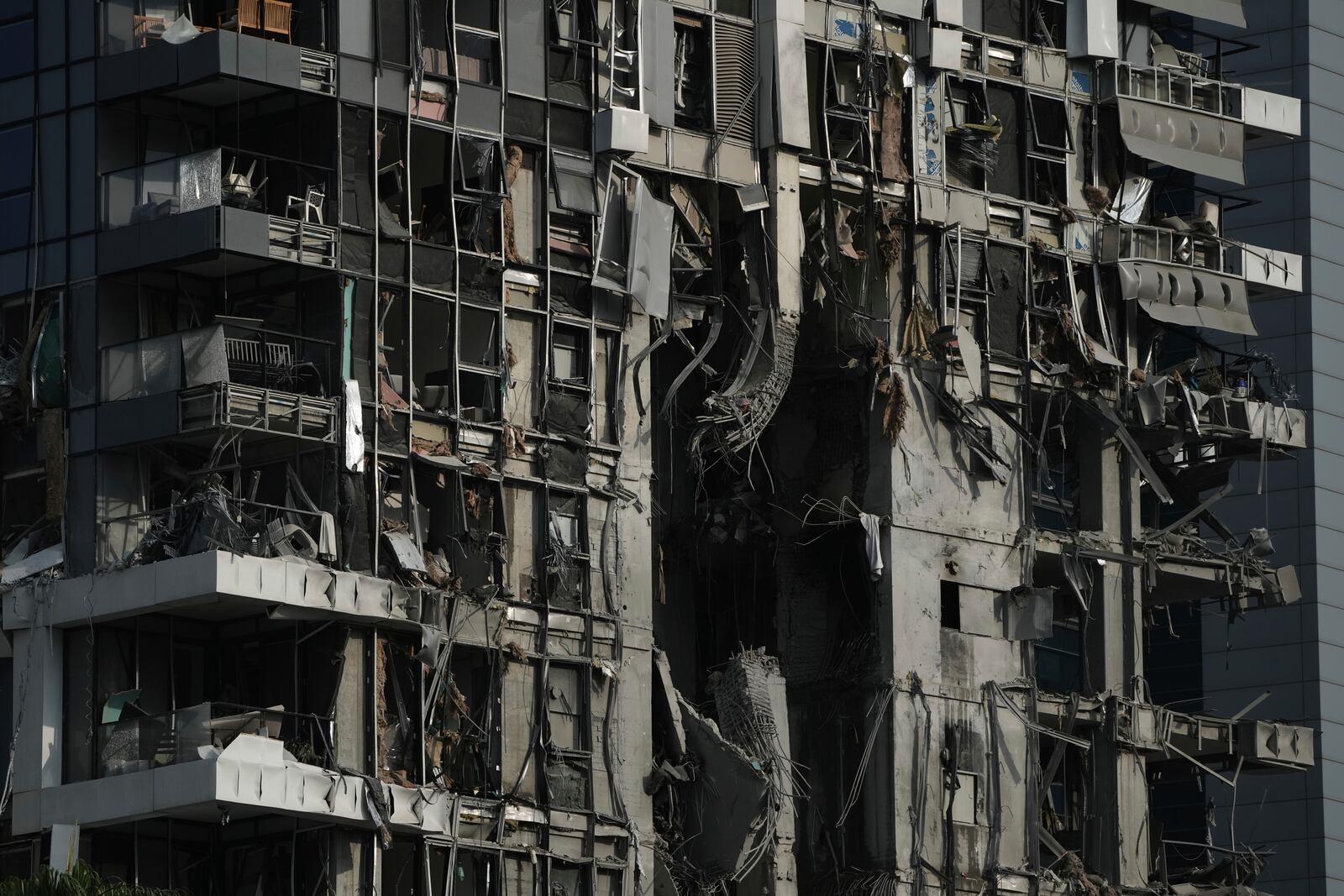 A residential building that was struck by a missile fired from Iran, is seen in Tel Aviv, Israel, on Saturday, June 14, 2025. (AP Photo/Leo Correa)