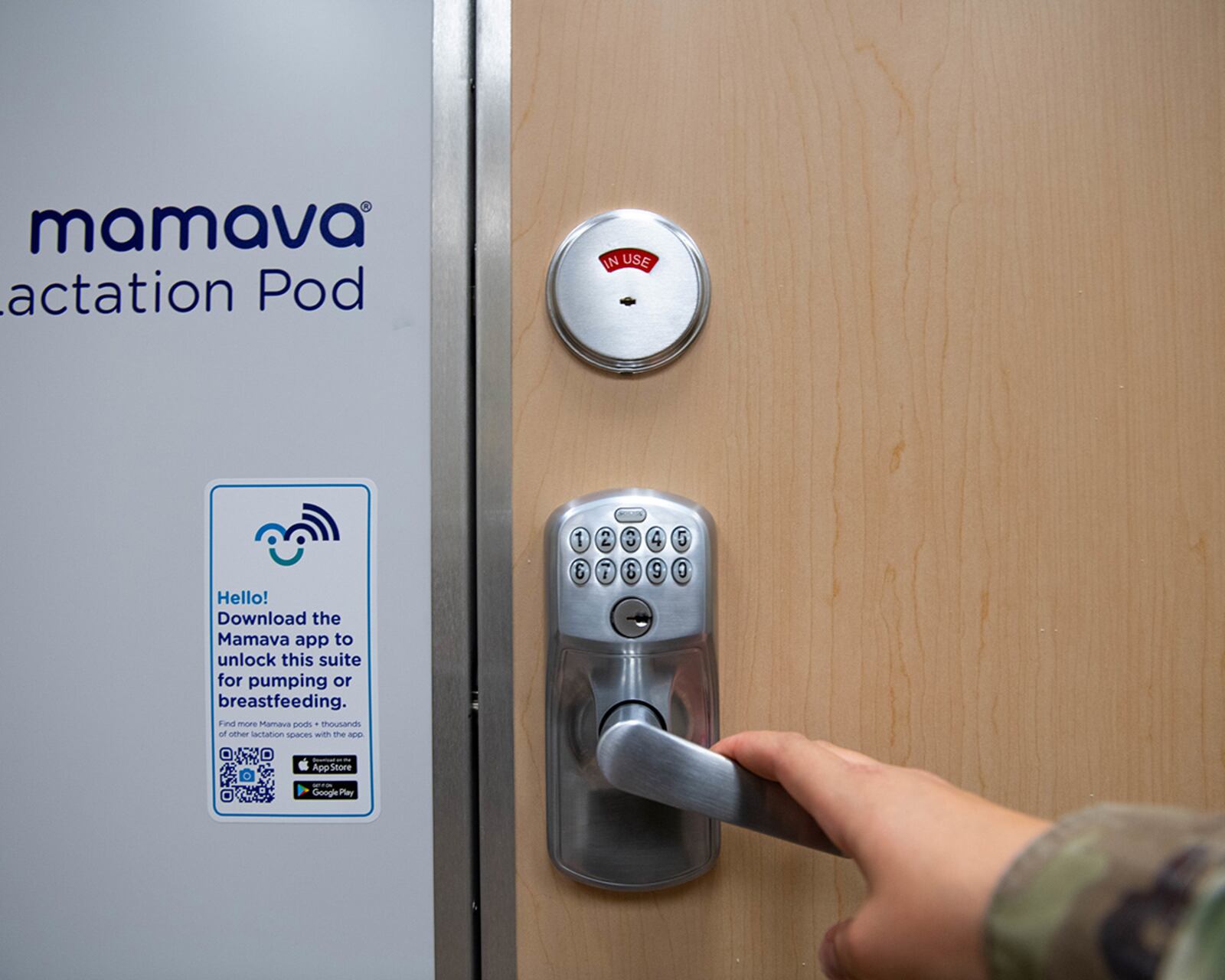A red indicator above the door handle indicates somebody is using the Mamava Lactation Pod at Luke Air Force Base, Ariz. Nov. 17. All Airmen, including civilian employees, who are nursing mothers are permitted to use the lactation pods. These resources enable each unit to meet mission requirements while taking care of Airmen. U.S. AIR FORCE PHOTO/AIRMAN 1ST CLASS BROOKE MOEDER