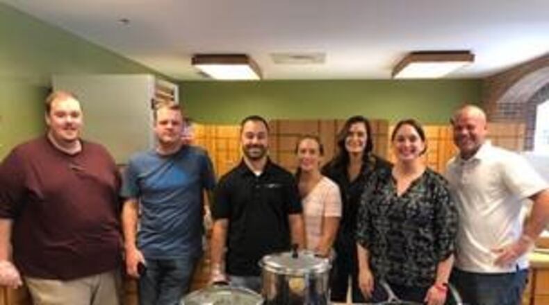 La-Z-Boy staff members from the region making a home-cooked meal for families of hospitalized children