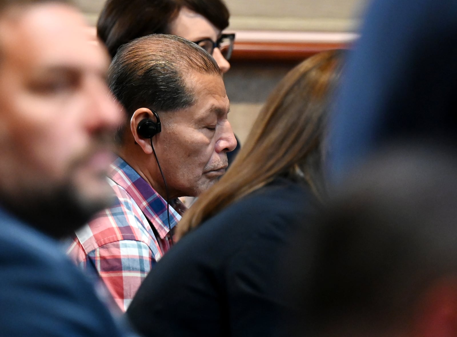 Antonio Riano sits at the defense table on Friday, June 13, 2025, during his murder trial in Butler County Common Pleas Court. The 63-year-old Mexican national was indicted in 2005 for the December 2004 shooting of Benjamin Becarra outside a Hamilton bar. He was sentenced to 18 years to life in prison on July 14, 2025. MICHAEL D. PITMAN/STAFF