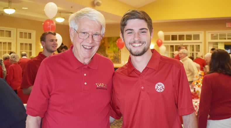 The Knolls of Oxford resident Jack Southard and a Miami University student from the glee club. CONTRIBUTED