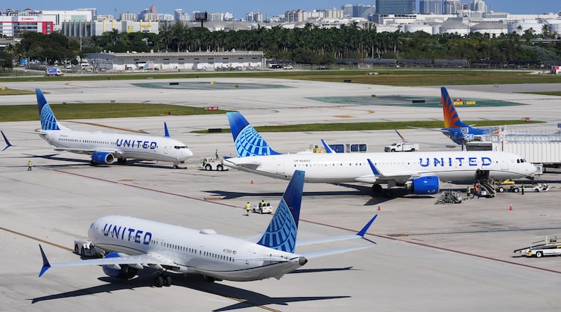 United Airlines aircraft move from the gate at Fort Lauderdale-Hollywood International Airport, Thursday, Nov. 13, 2025, in Fort Lauderdale, Fla. (AP Photo/Lynne Sladky)