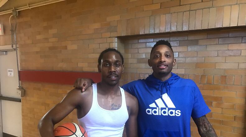 Kenny Hayes (right) and Juwan Staten. Tom Archdeacon/STAFF