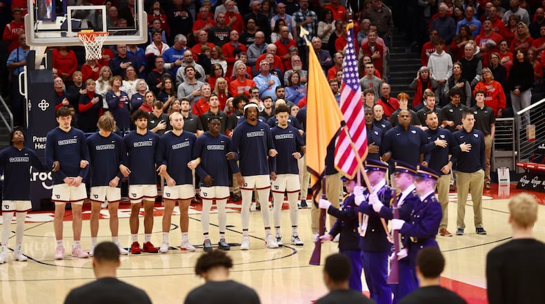 Dayton stands for the national anthem before a game against SIUE on Monday, Nov. 6, 2023, at UD Arena. David Jablonski/Staff