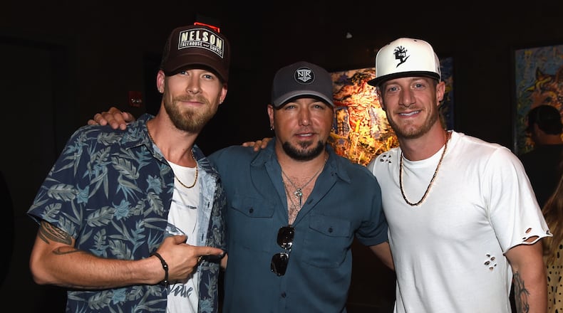 NASHVILLE, TN - AUGUST 02:  Singer/Songwriter Florida Georgia Line's Brian Kelley and Tyler Hubbard with Singer/Songwriter Jason Aldean backstage during Jason Aldean's Triple #1 Party at Wildhorse Saloon on August 2, 2017 in Nashville, Tennessee.  (Photo by Rick Diamond/Getty Images)