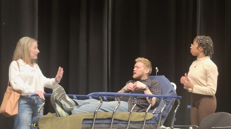Heather Martin, Jared Mola, Mikki McKenzie rehearse for "The Cure" at the Dayton Playhouse.