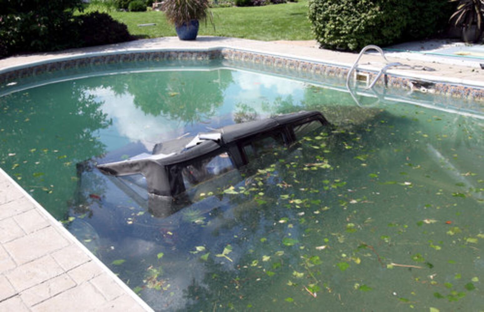 Jeep driven into pool