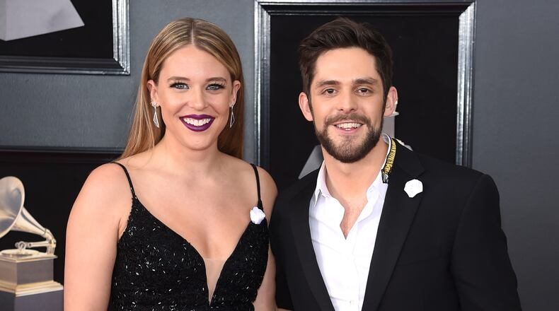 NEW YORK, NY - JANUARY 28:  Lauren Akins (L) and reecording artist Thomas Rhett attend the 60th Annual GRAMMY Awards at Madison Square Garden on January 28, 2018 in New York City.  (Photo by Jamie McCarthy/Getty Images)