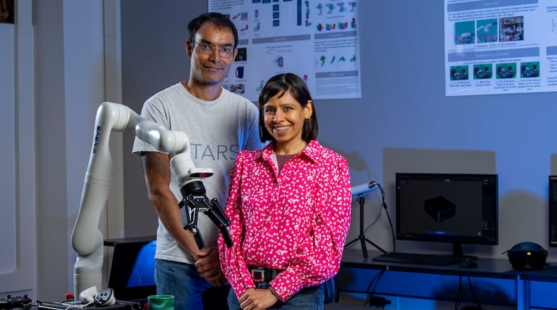Sean and Natasha Banerjee pose in their lab. The two Wright State University professors recently received a $3 million grant from the National Science Foundation to study small-scale manufacturing and recycling. Courtesy of Wright State University.