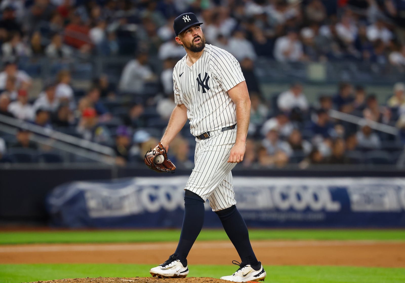 New York Yankees pitcher Carlos Rodón reacts after giving up a two-run home run against the Boston Red Sox during the fifth inning of a baseball game, Sunday, June 8, 2025, in New York. (AP Photo/Noah K. Murray)